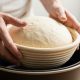Chicago home baker shaping bread dough before proofing