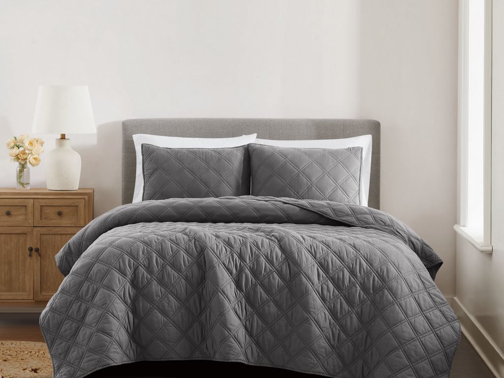Durable queen bedding set with plush comforter and wrinkle-free sheets.